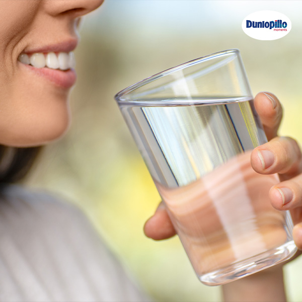 Happy Beautiful Young Woman Drinking Water